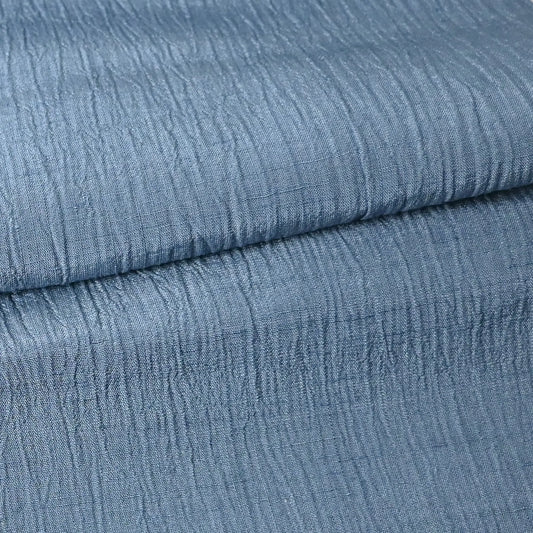 Detailed photo of vintage calm blue grey tone silk kimono fabric with distinctive texture, sold by the metre.