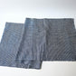 Full view of vintage Chinese hand loomed indigo check cotton piece.