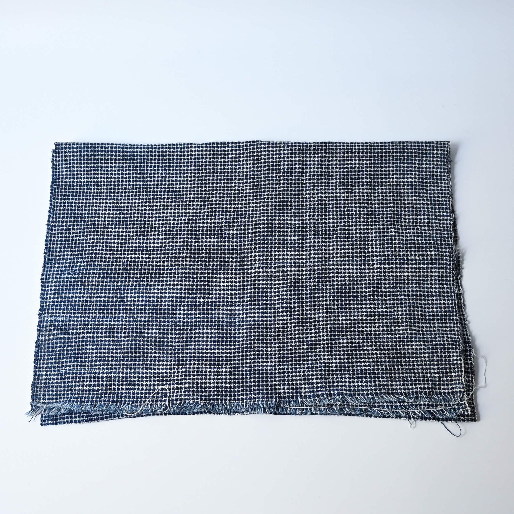Vintage Chinese hand loomed indigo check cotton piece.