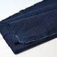 Close-up vintage Chinese indigo check cotton piece with natural texture.