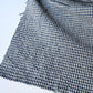 Close-up view of vintage Chinese indigo cotton with small check pattern, suitable for soft furnishings.