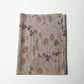 Vintage Japanese Chirimen silk crepe kimono fabric piece in muted mauve tones with floral motif.