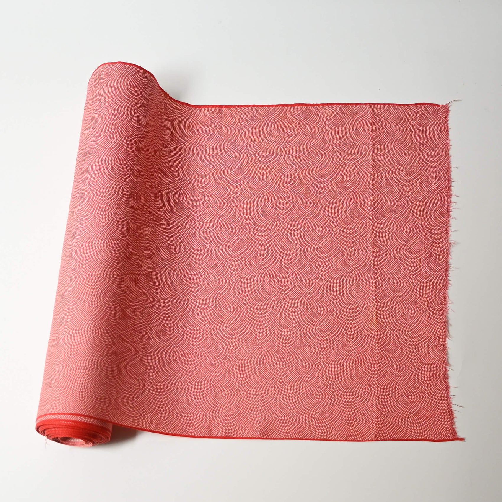 Vintage edokomon kimono silk fabric in red coral with seigaiha wave pattern sold by the metre.