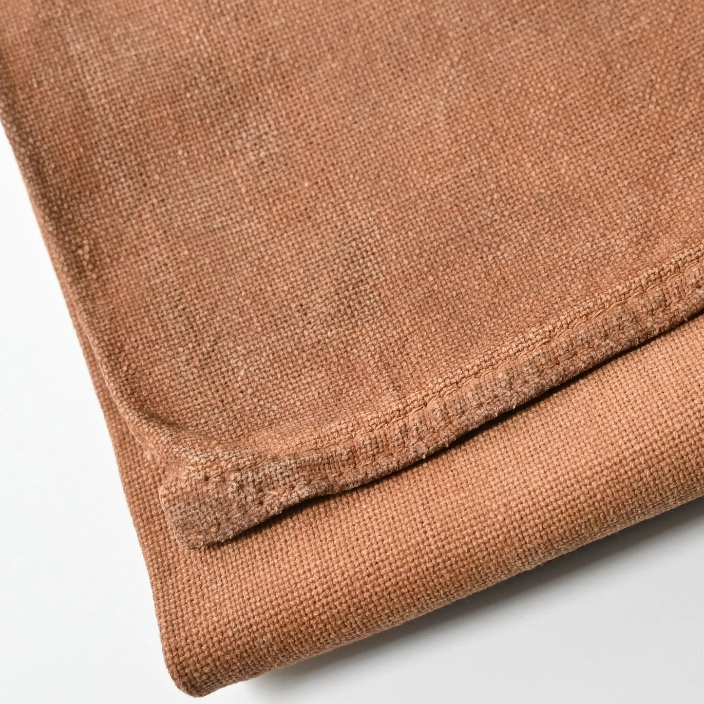 Detailed view of vintage heavy cotton sake bag called Sakabukuro, dyed with kakishibu fermented persimmon juice.