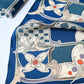 Close-up view of rare vintage deep blue silk kimono fabric with modern European-inspired design.