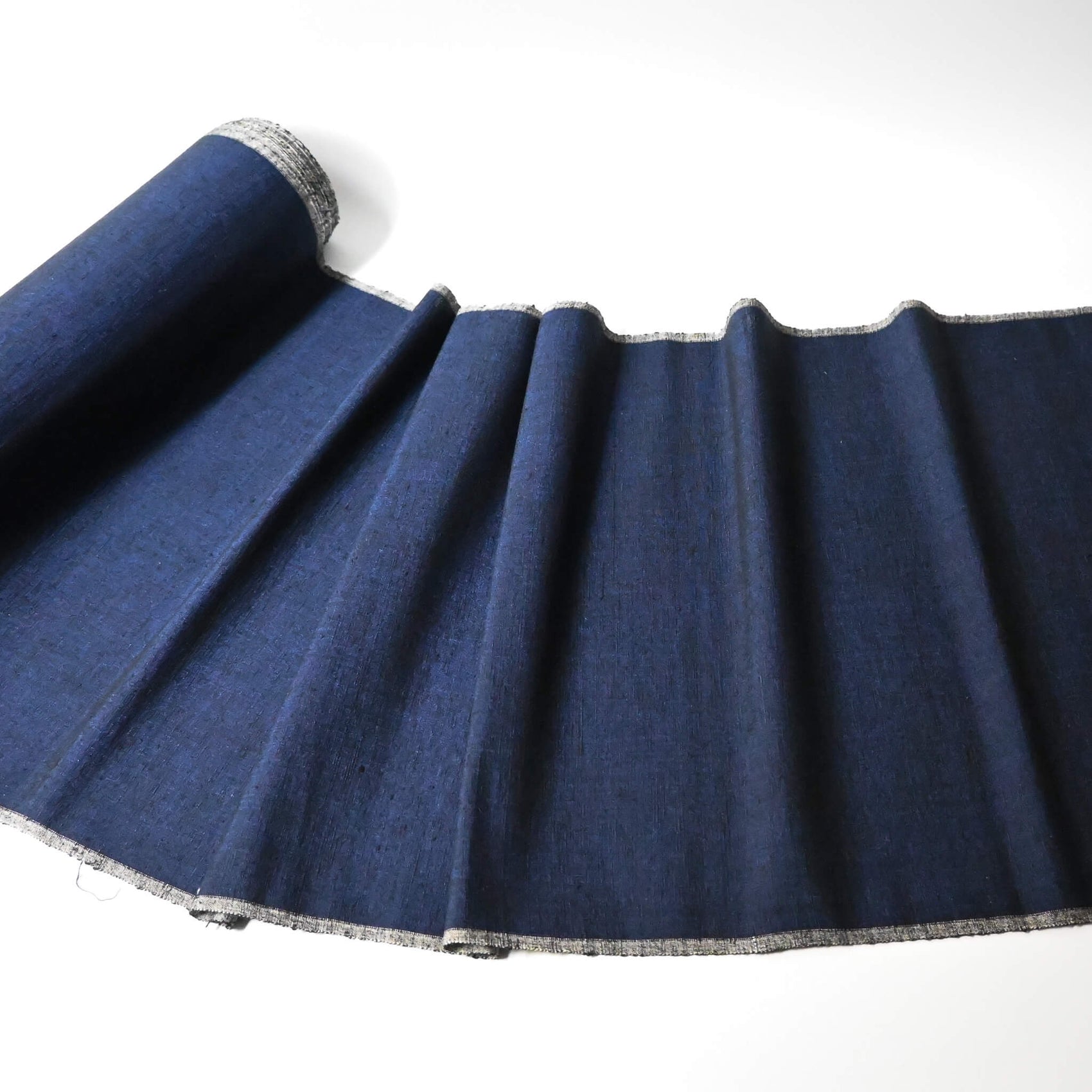 Full view of vintage deep rich blue tsumugi silk kimono fabric with gentle sheen, sold by the metre.