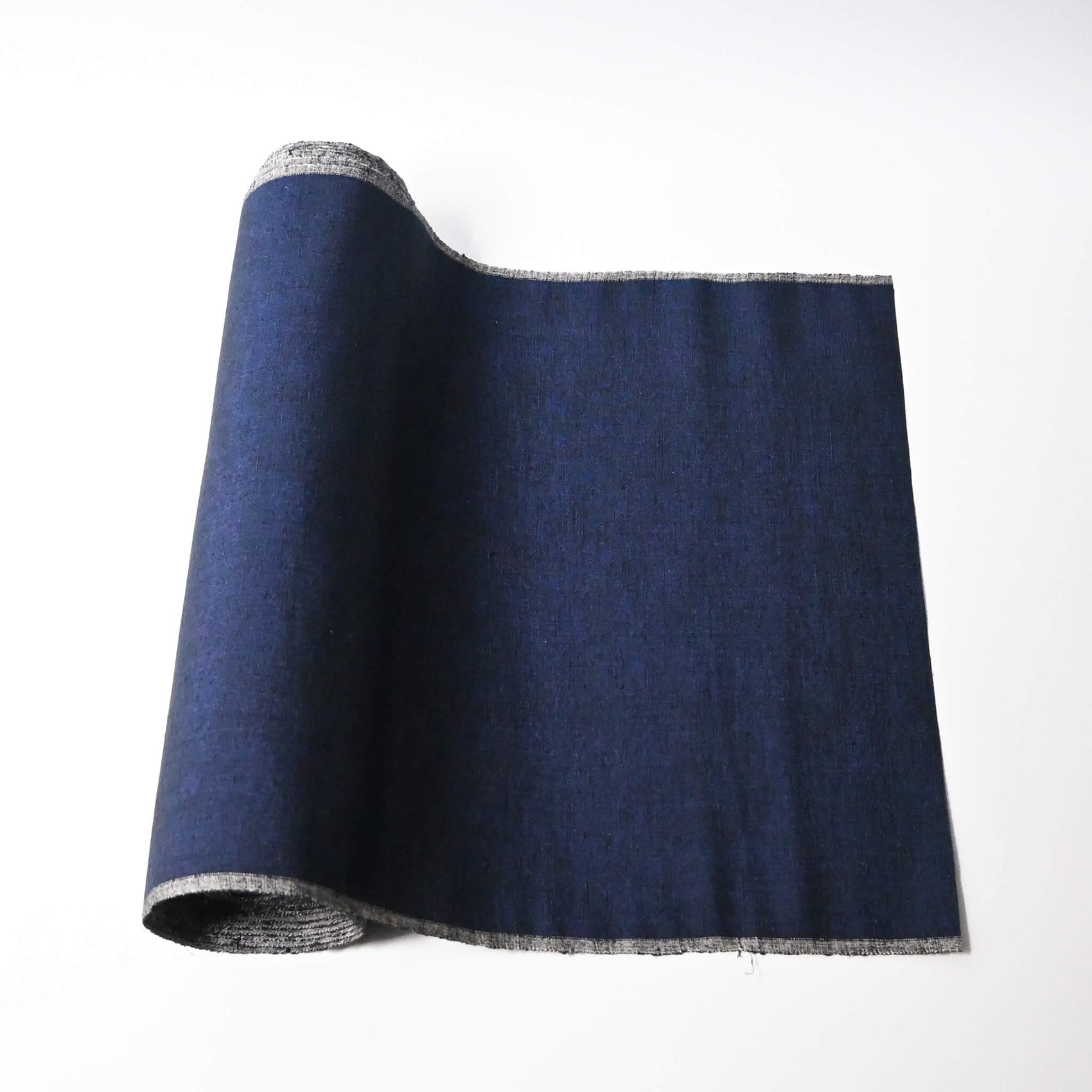 Vintage deep rich blue tsumugi silk kimono fabric sold by the metre.