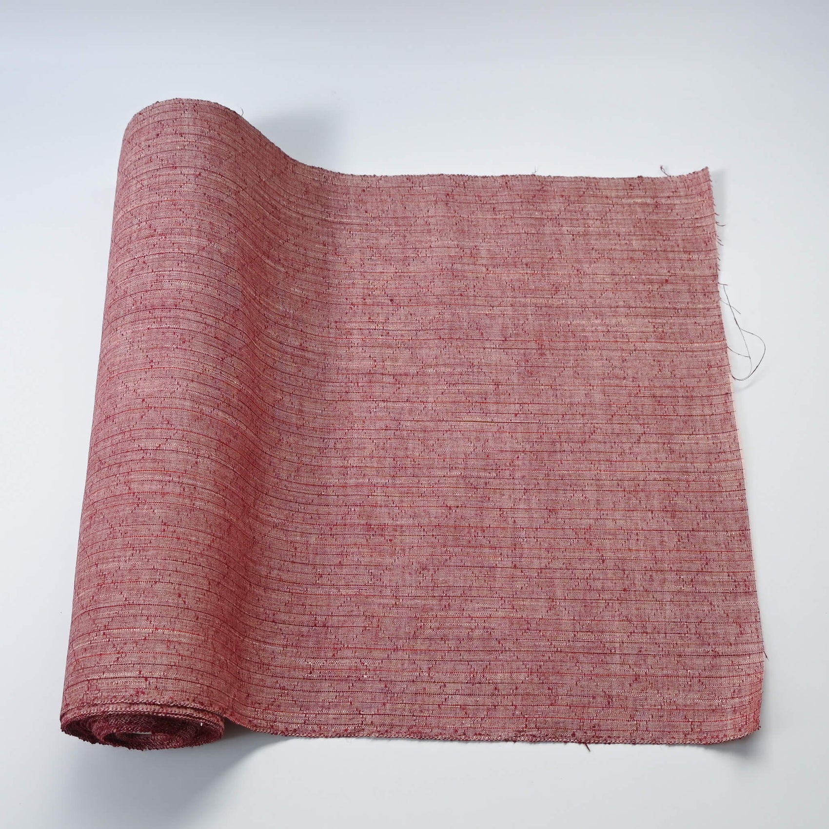 Vintage dusty pink tsumugi silk kimono fabric sold by the metre.