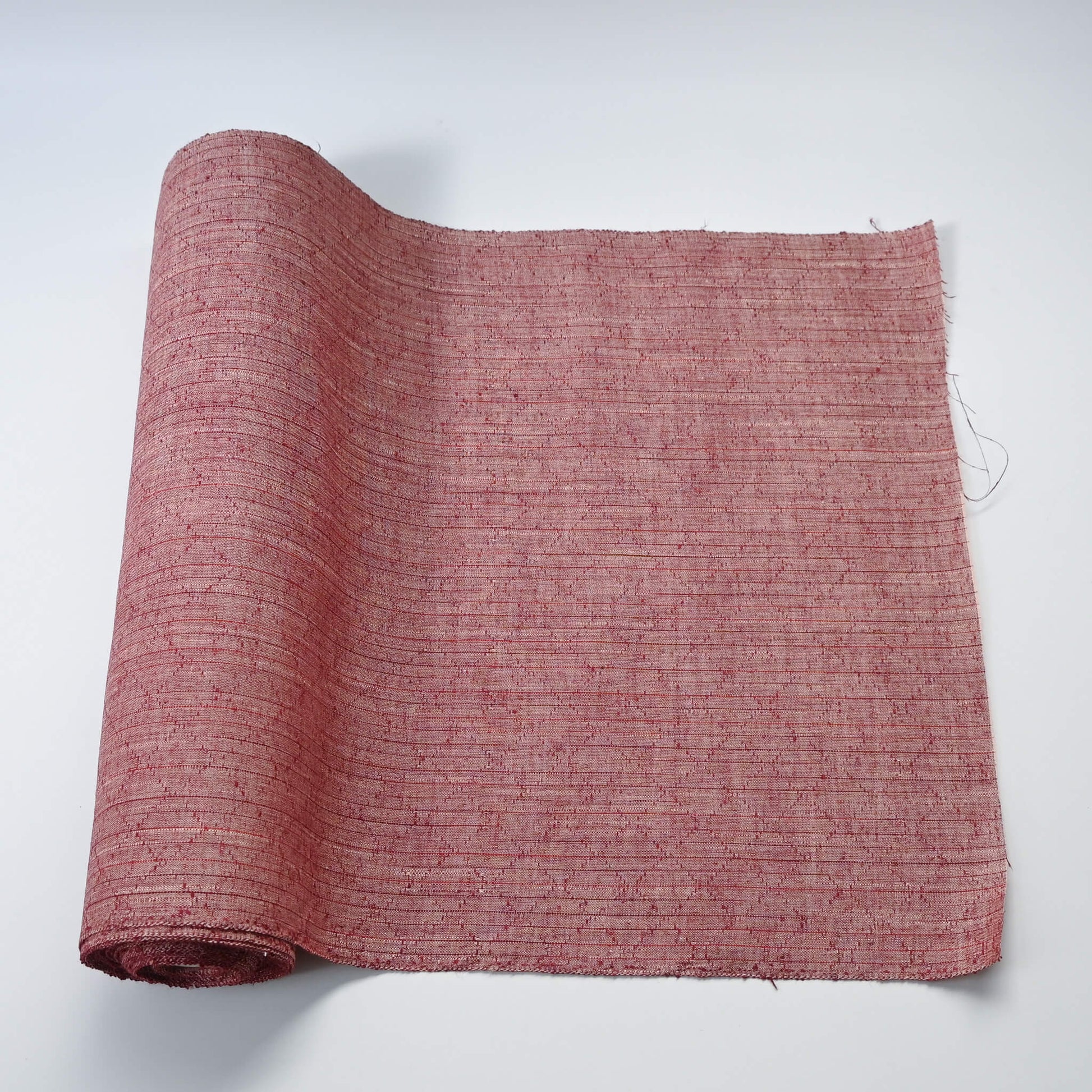 Vintage dusty pink tsumugi silk kimono fabric sold by the metre.