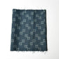 Vintage fine silk kimono fabric piece in dark emerald green with simple square pattern.