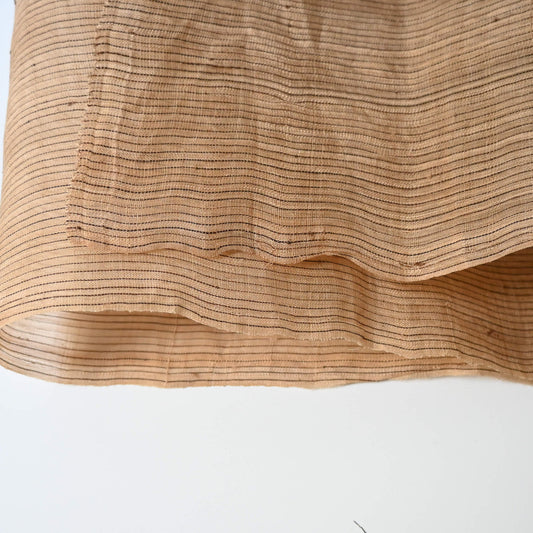 Close-up view of vintage collectable bashofu banana fibre textile, natural fine stripe pattern.