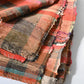 Close-upl view of vintage Japanese five-panel Sakiori rag-weaving textile made from recycled old kimono and futon fabrics. 