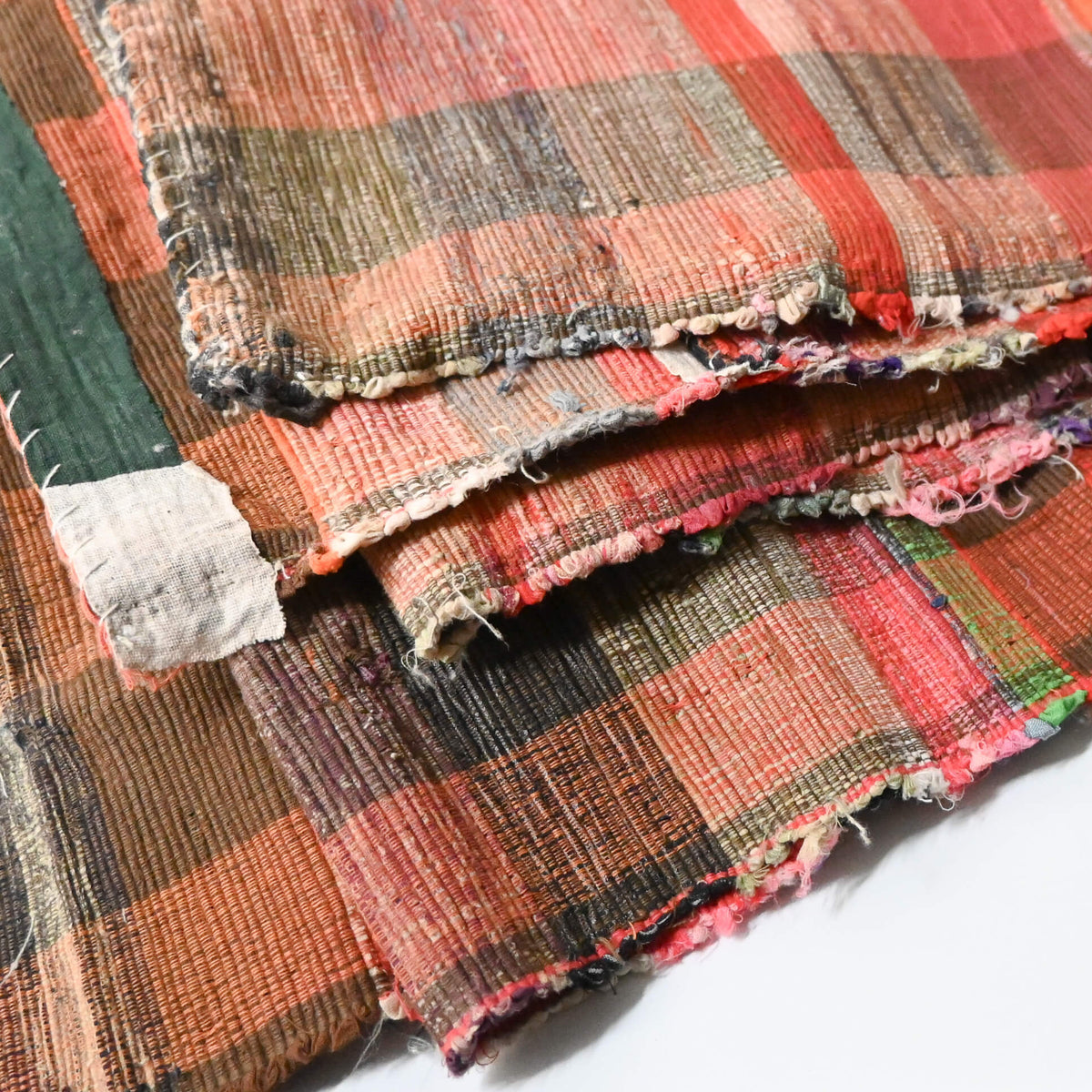 Close-upl view of vintage Japanese five-panel Sakiori rag-weaving textile made from recycled old kimono and futon fabrics. 