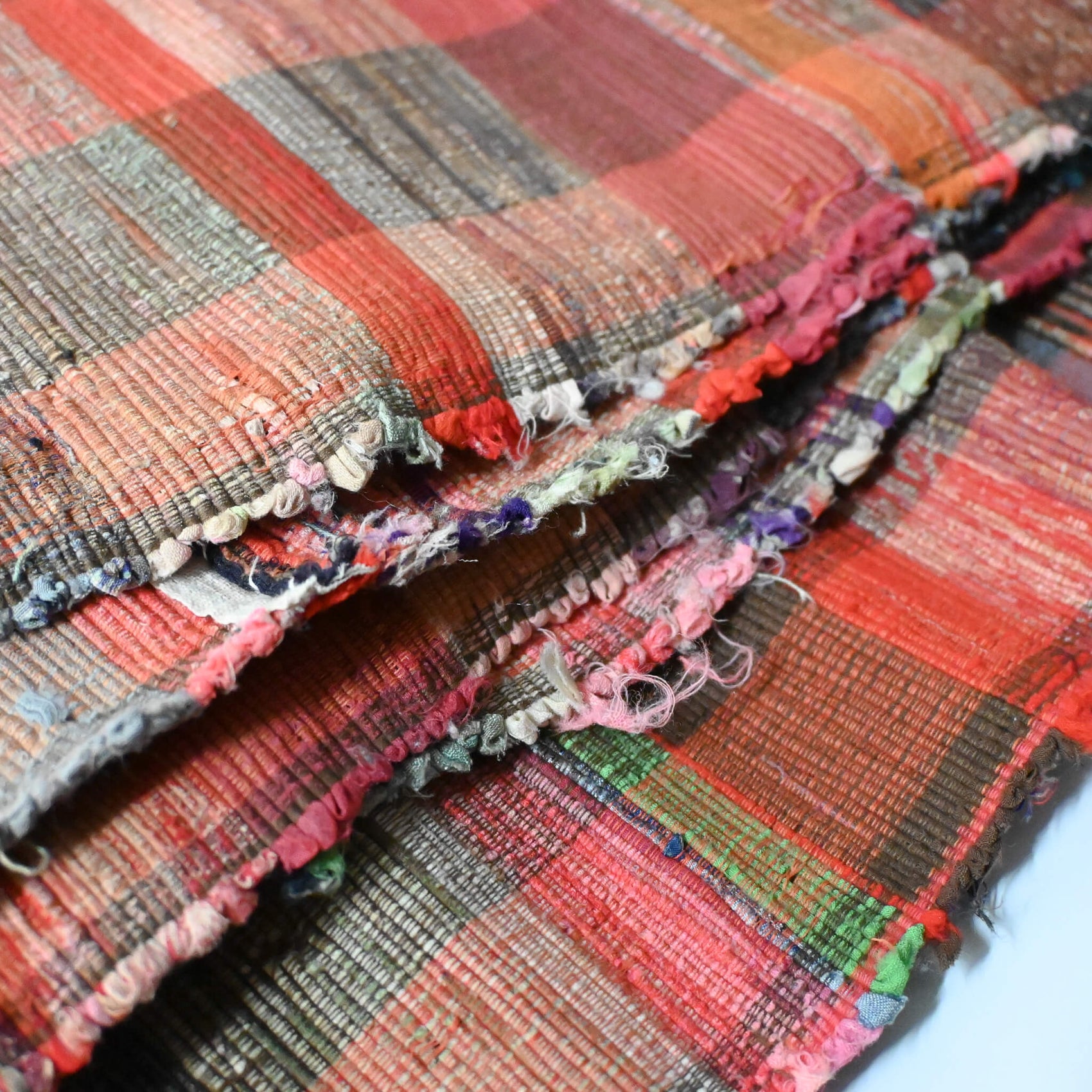Close-upl view of vintage Japanese five-panel Sakiori rag-weaving textile made from recycled old kimono and futon fabrics. 