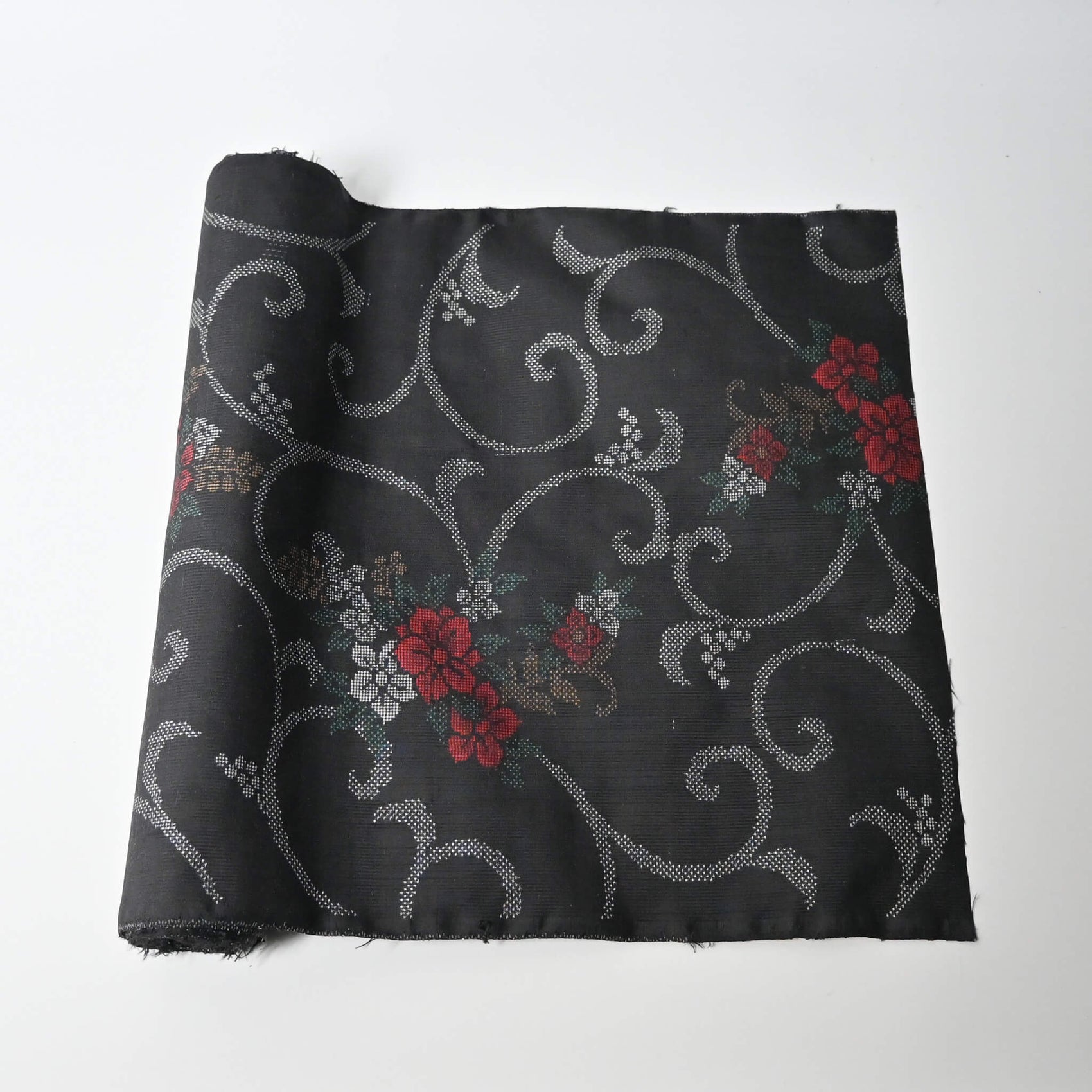 Vintage flora Oshima tsumugi silk kimono fabric sold by the metre.