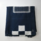 Vintage Japanese four-panel indigo kasuri cotton futon cover with a bold geometric design.