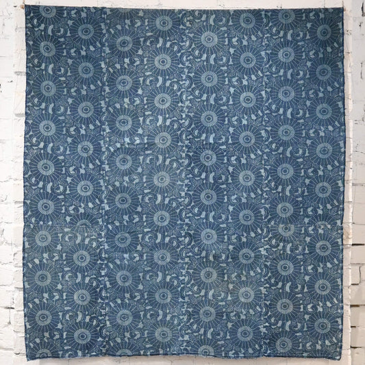 Vintage four-panel indigo katazome dyed cotton futon cover with chrysanthemum arabesque motif.