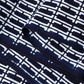 Close-up view of vintage traditional Japanese men's yukata cotton fabric sold by the metre.