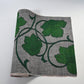 Vintage Japanese grey tsumugi silk kimono fabric with deep green large-scale floral design, sold by the metre.