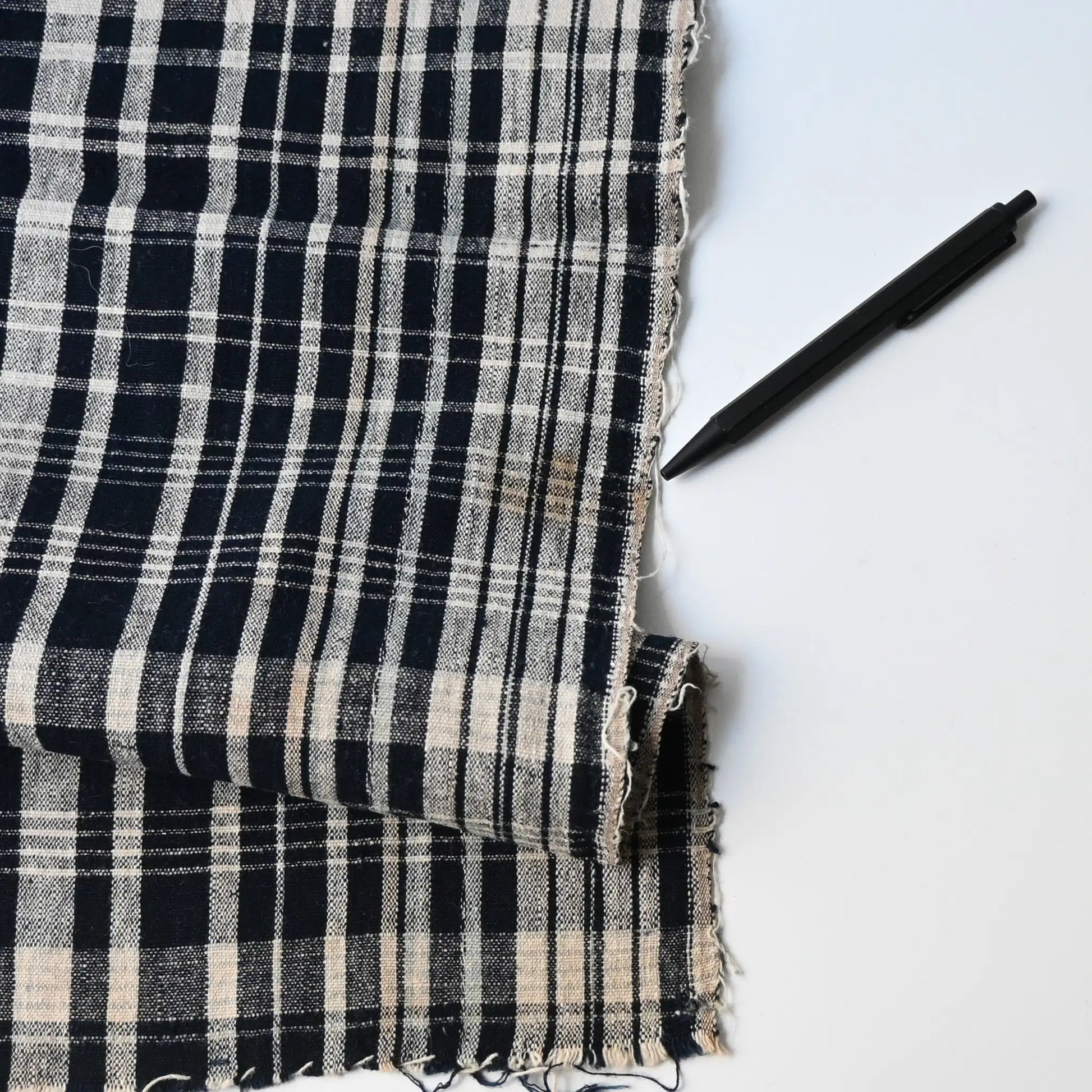 Stained  part of vintage Japanese indigo hand-loomed check cotton.