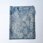 Vintage heavy silk crepe chirimen kimono fabric, katazome dyed chrysanthemum in soft blue.