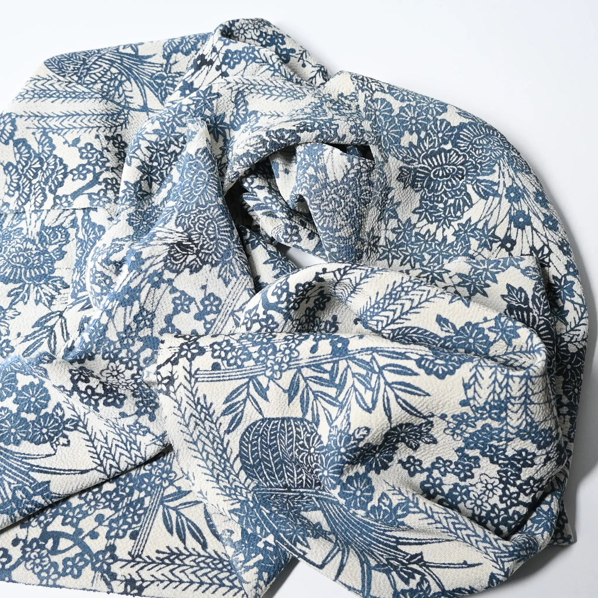 Vintage heavy silk crepe Chirimen kimono fabric with indigo floral pattern drapes well. 