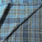 Detailed view of vintage Japanese soft indigo and green tartan check cotton futon cover from the mid-20th century.