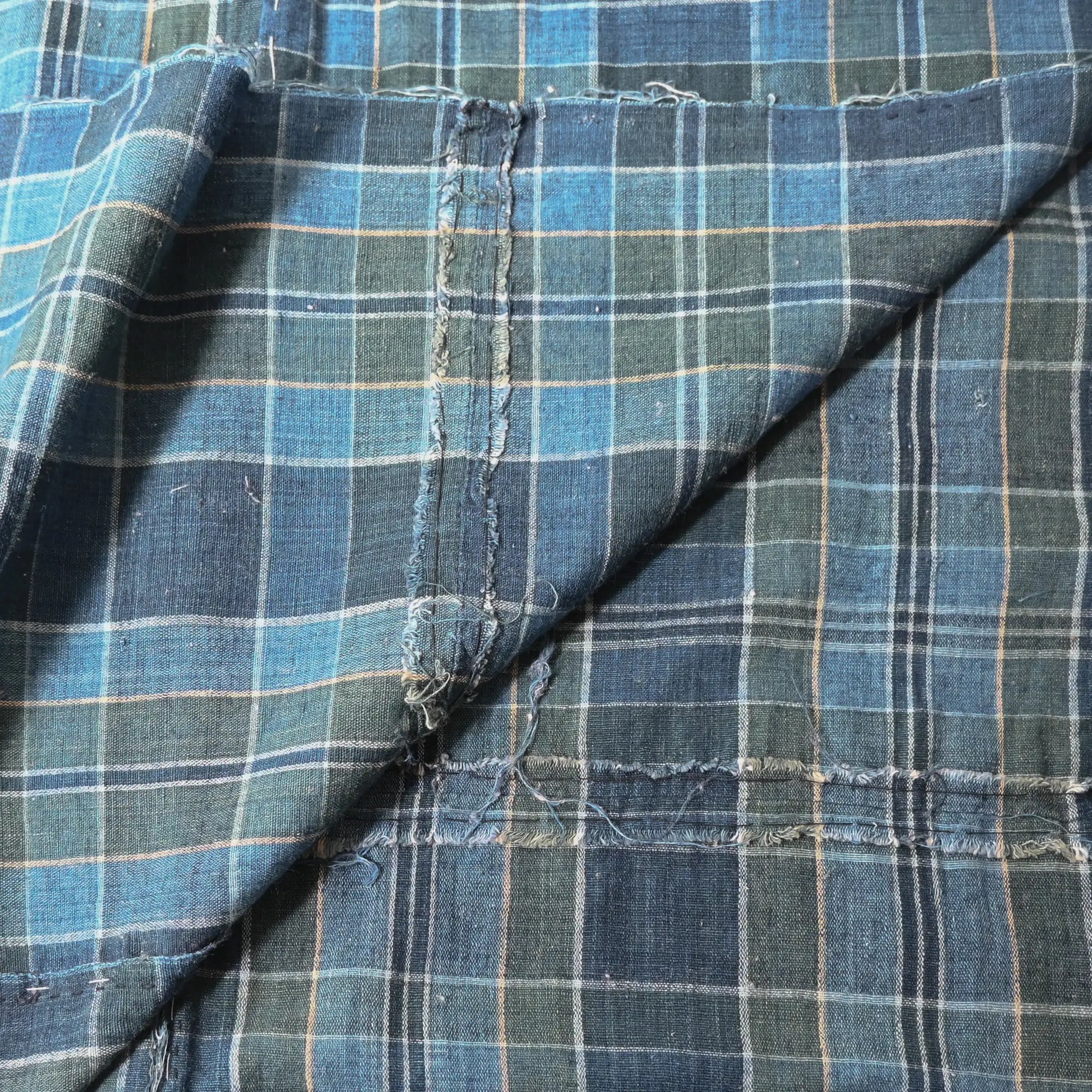 Detailed view of vintage Japanese soft indigo and green tartan check cotton futon cover from the mid-20th century.