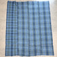 Full view of vintage Japanese soft indigo and green tartan check cotton futon cover from the mid-20th century.