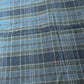 Detailed view of vintage Japanese soft indigo and green tartan check cotton futon cover from the mid-20th century.