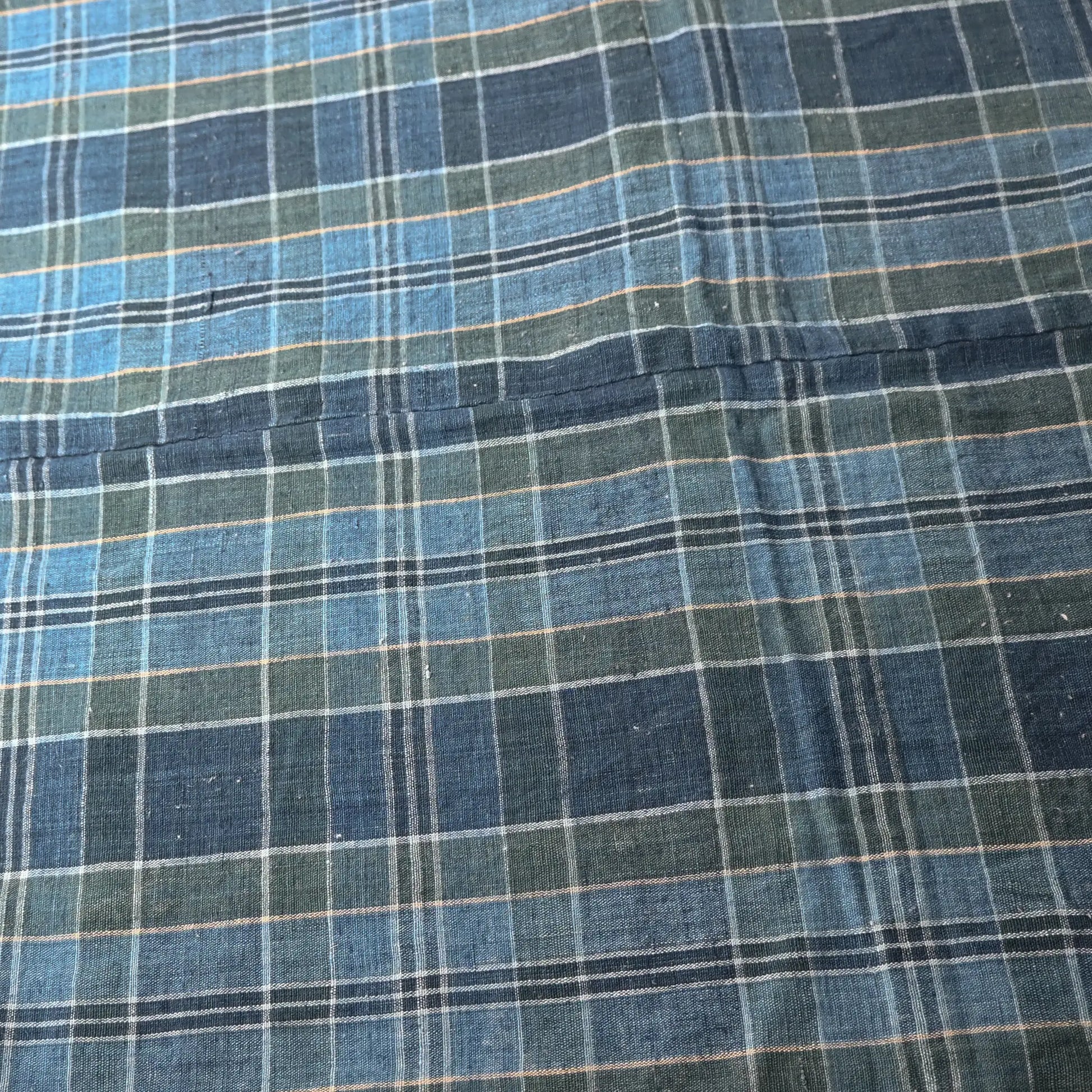 Detailed view of vintage Japanese soft indigo and green tartan check cotton futon cover from the mid-20th century.