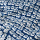 Close-up view of vintage handcrafted Arimatsu shibori cotton piece from a summer kimono yukata.