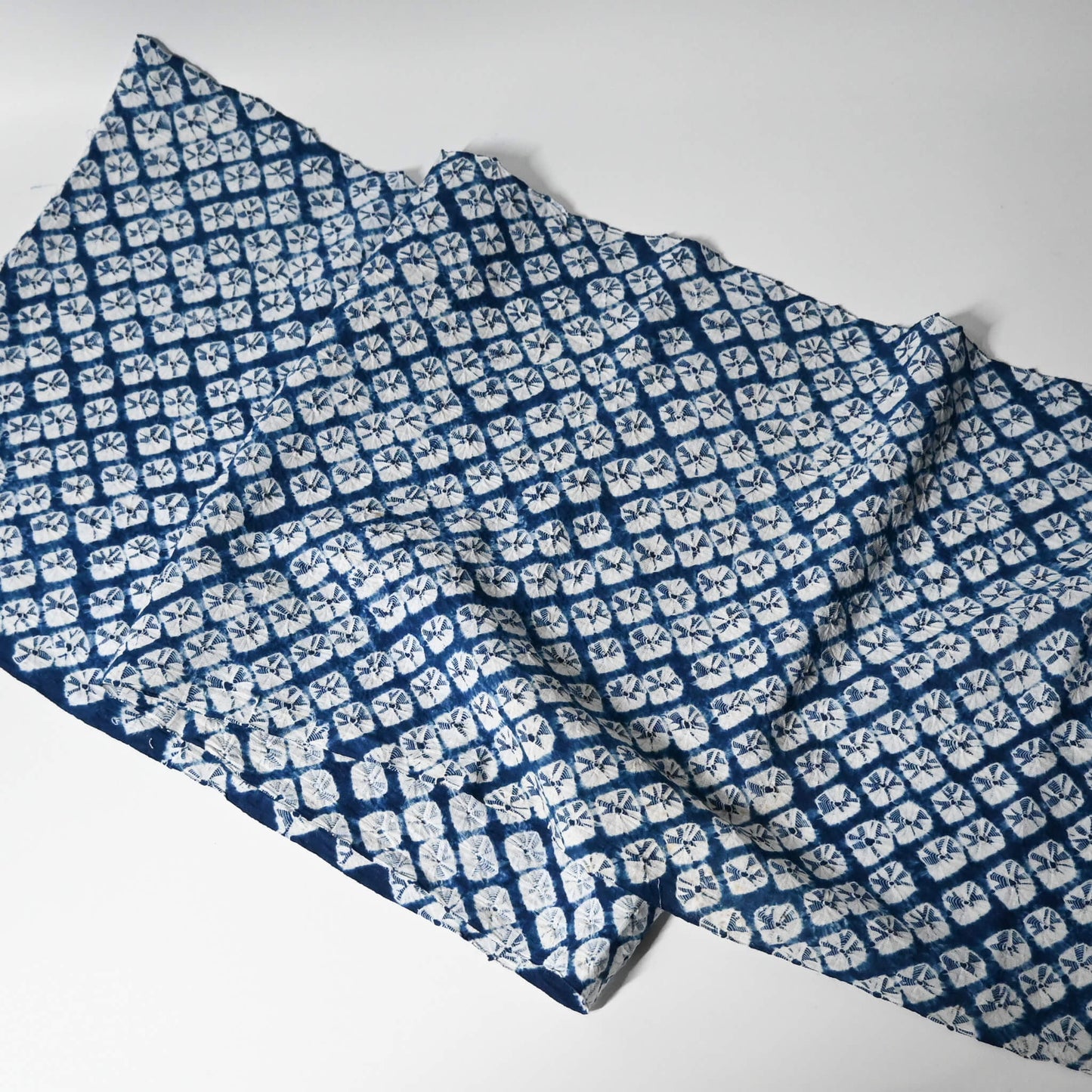 Full view of vintage handcrafted Arimatsu shibori cotton piece from a summer kimono yukata.