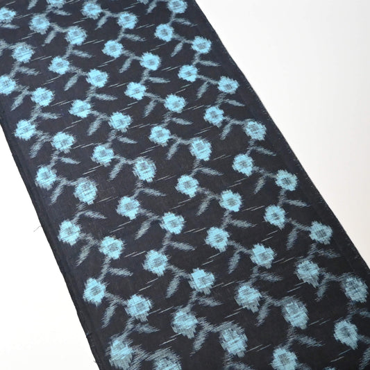 Full view of vintage indigo kasuri cotton kimono fabric piece.