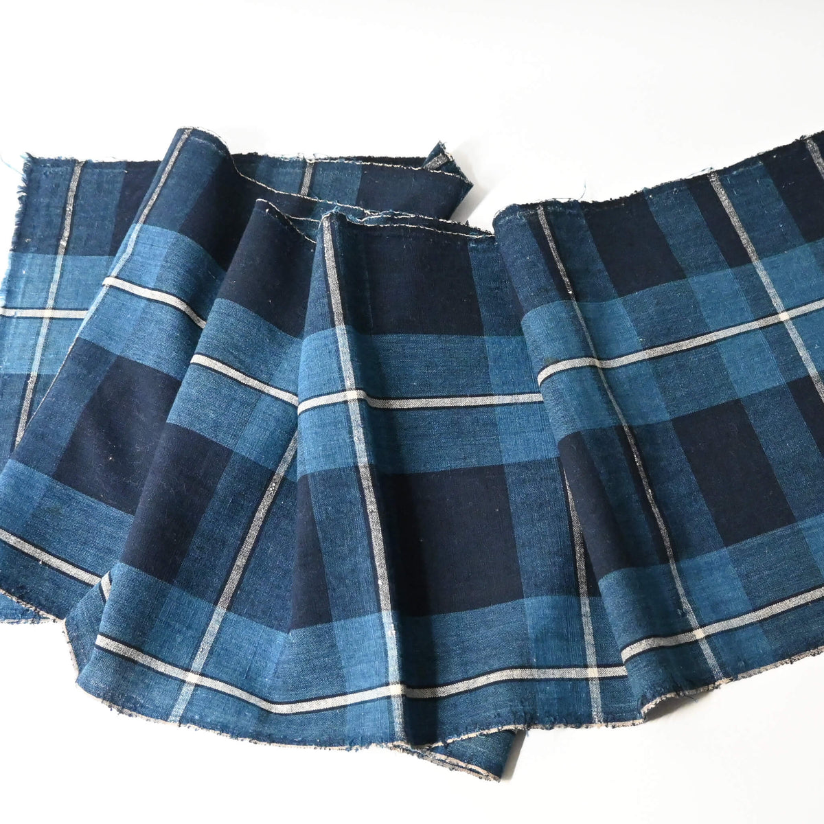 Full view of vintage Japanese indigo cotton futon cover panel with bold check pattern.