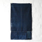 A fragment of Japanese  indigo boro piece from a futon cover.
