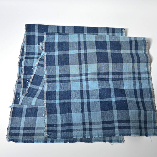 Full view of vintage Japanese indigo cotton piece from a futon cover with a large check woven pattern.