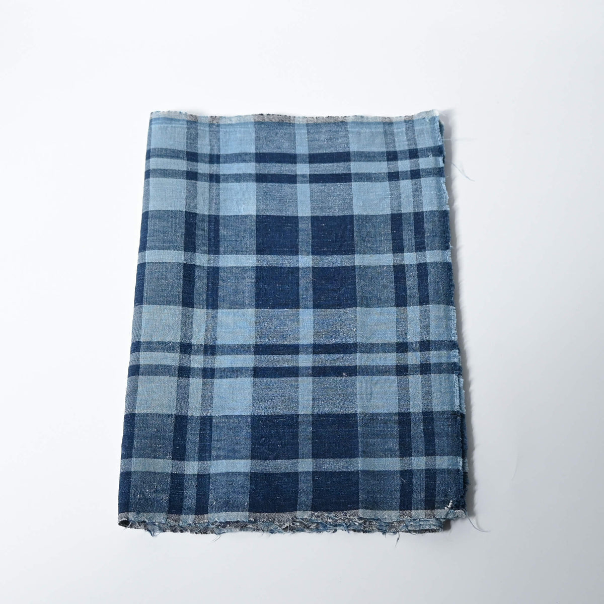 Vintage Japanese indigo cotton piece from a futon cover with a large check woven pattern.