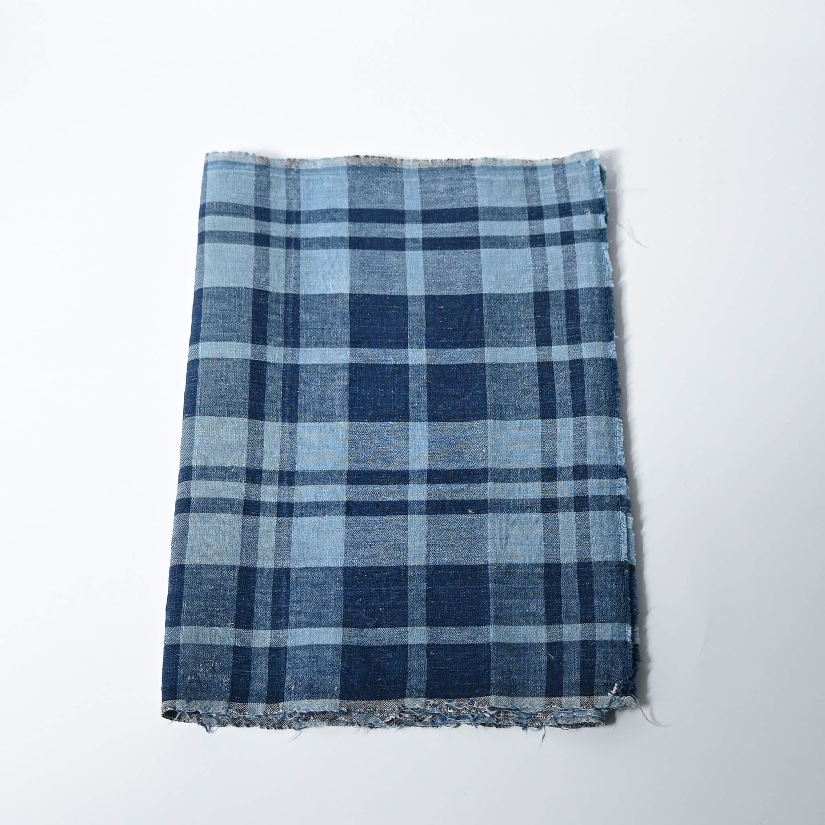 Vintage Japanese indigo cotton piece from a futon cover with a large check woven pattern.