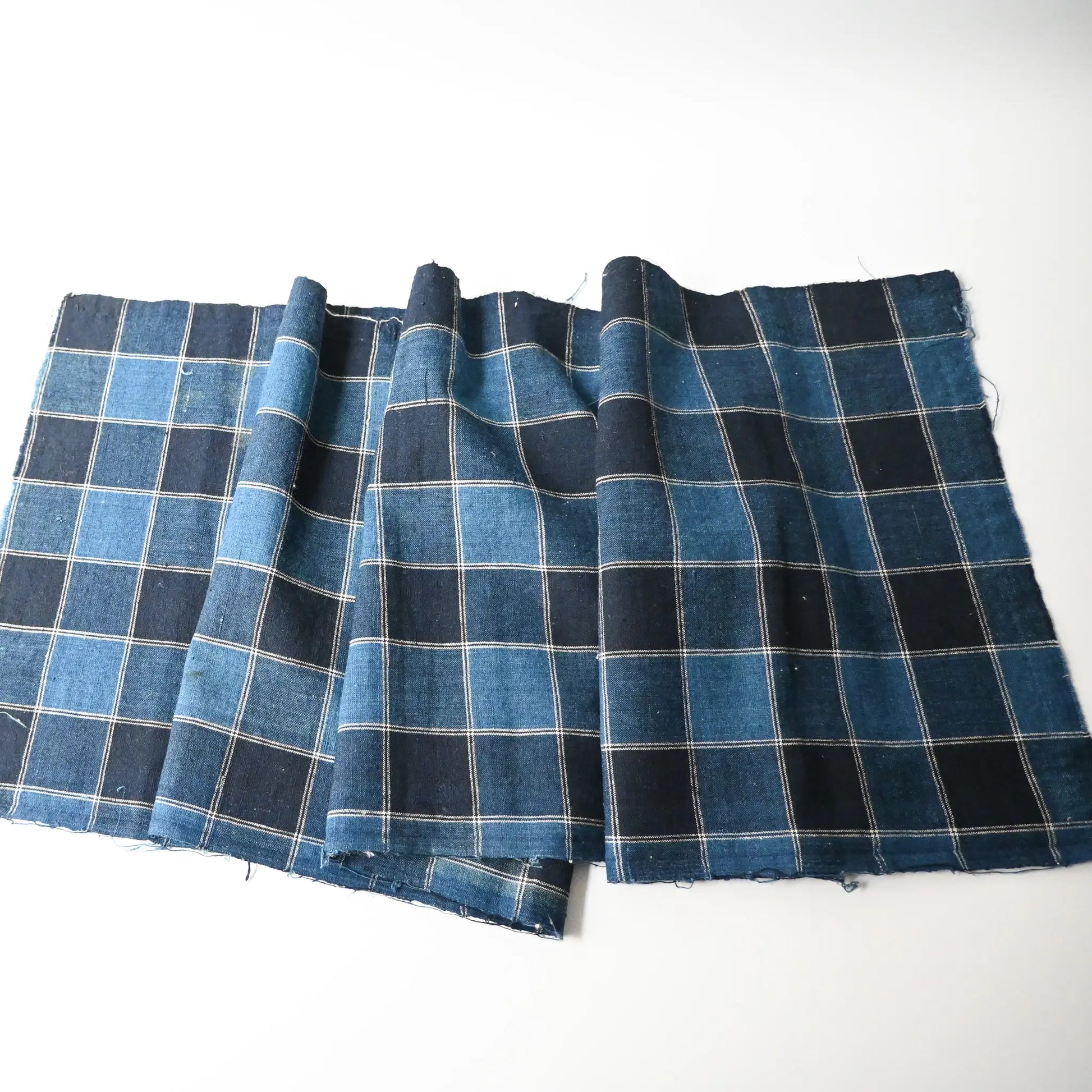 Full view of vintage indigo check cotton futon cover panel.