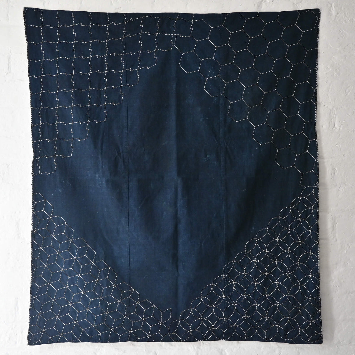 Full view of Vintage indigo cotton furoshiki with reinforced traditional Japanese sashiko stitch around the  corners.