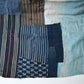 Detailed view of vintage futon cover made from a mix of various cottons recycled from kimono and kimono linings.