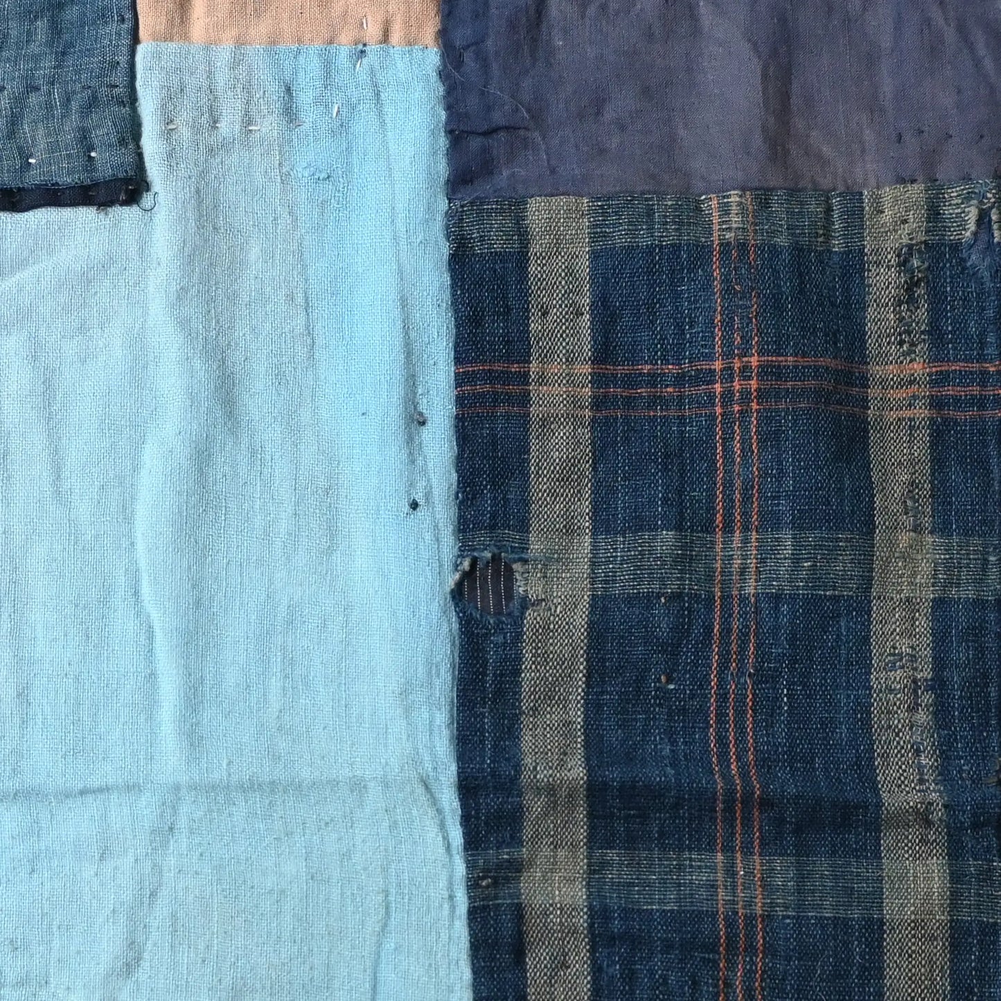 Detailed view of vintage futon cover made from a mix of various cottons recycled from kimono and kimono linings.