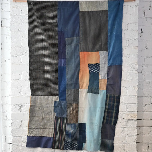 Full view of vintage futon cover made from a mix of various cottons recycled from kimono and kimono linings.