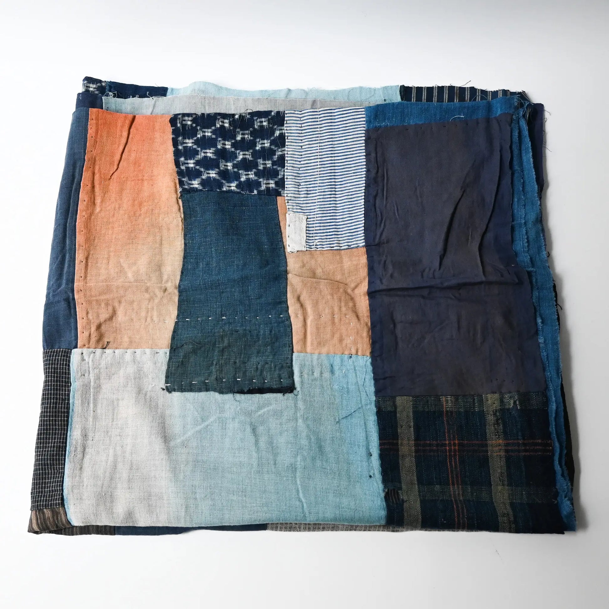 Vintage futon cover made from a mix of various cottons recycled from kimono and kimono linings.