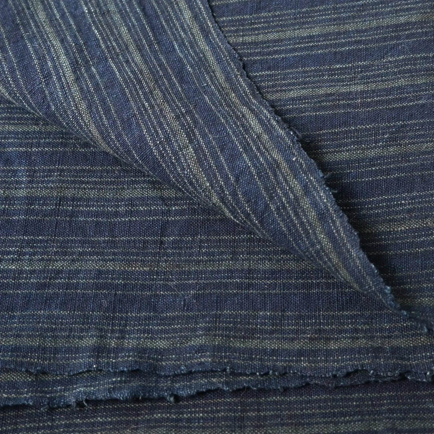 Close-up view of vintage Japanese indigo stripe cotton large furoshiki from the mid-20th century.