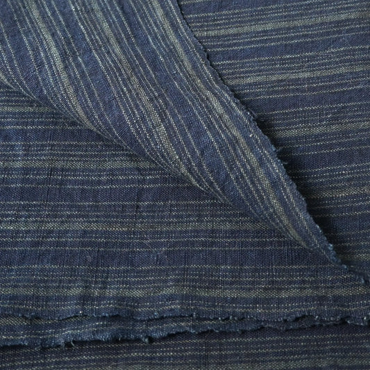 Close-up view of vintage Japanese indigo stripe cotton large furoshiki from the mid-20th century.