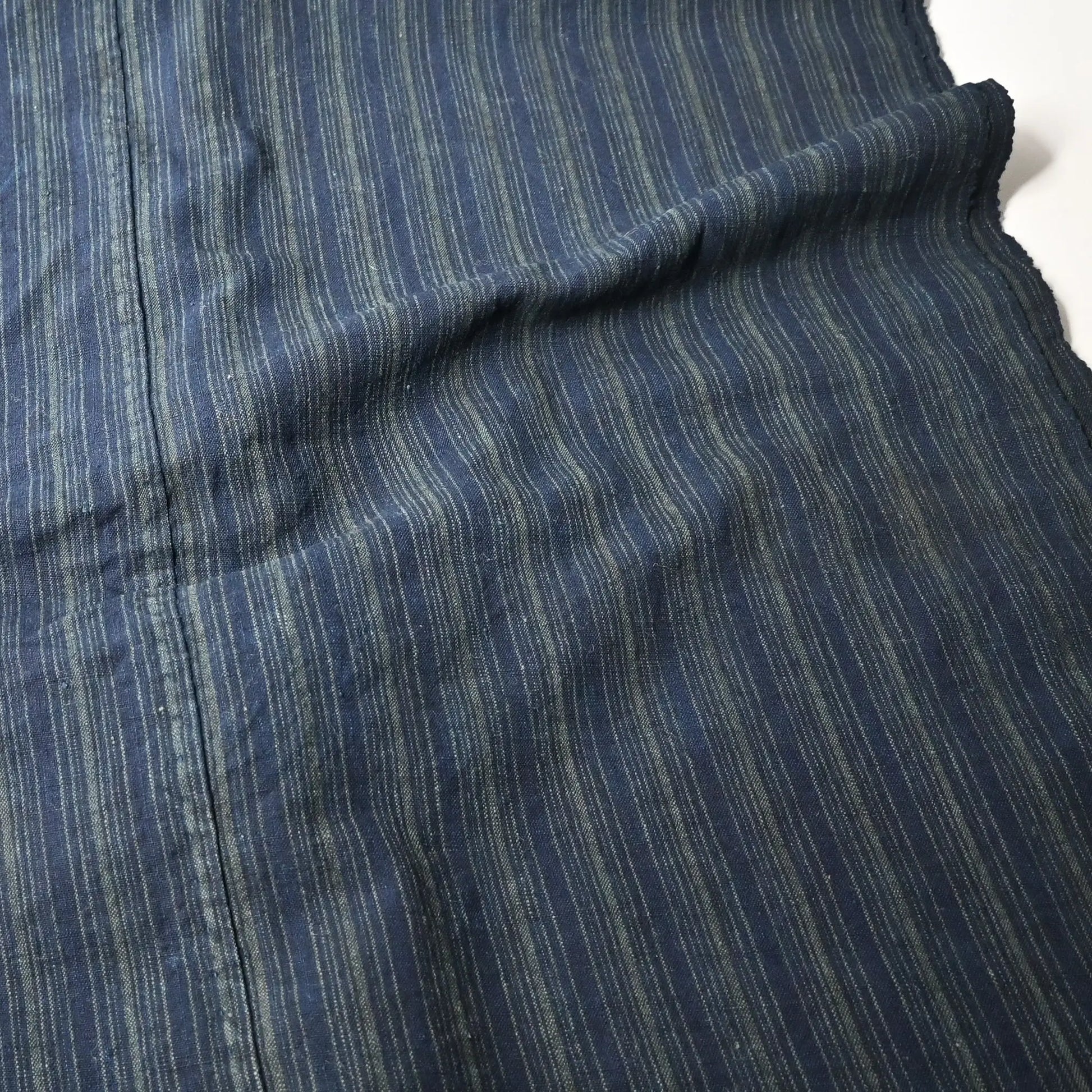 Detailed view of vintage Japanese indigo stripe cotton large furoshiki from the mid-20th century.