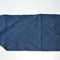 Detailed view of rare vintage indigo cotton tube cloth with mends.
