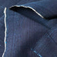 Close-up view of vintage fine stripe indigo cotton piece from undone kimono.